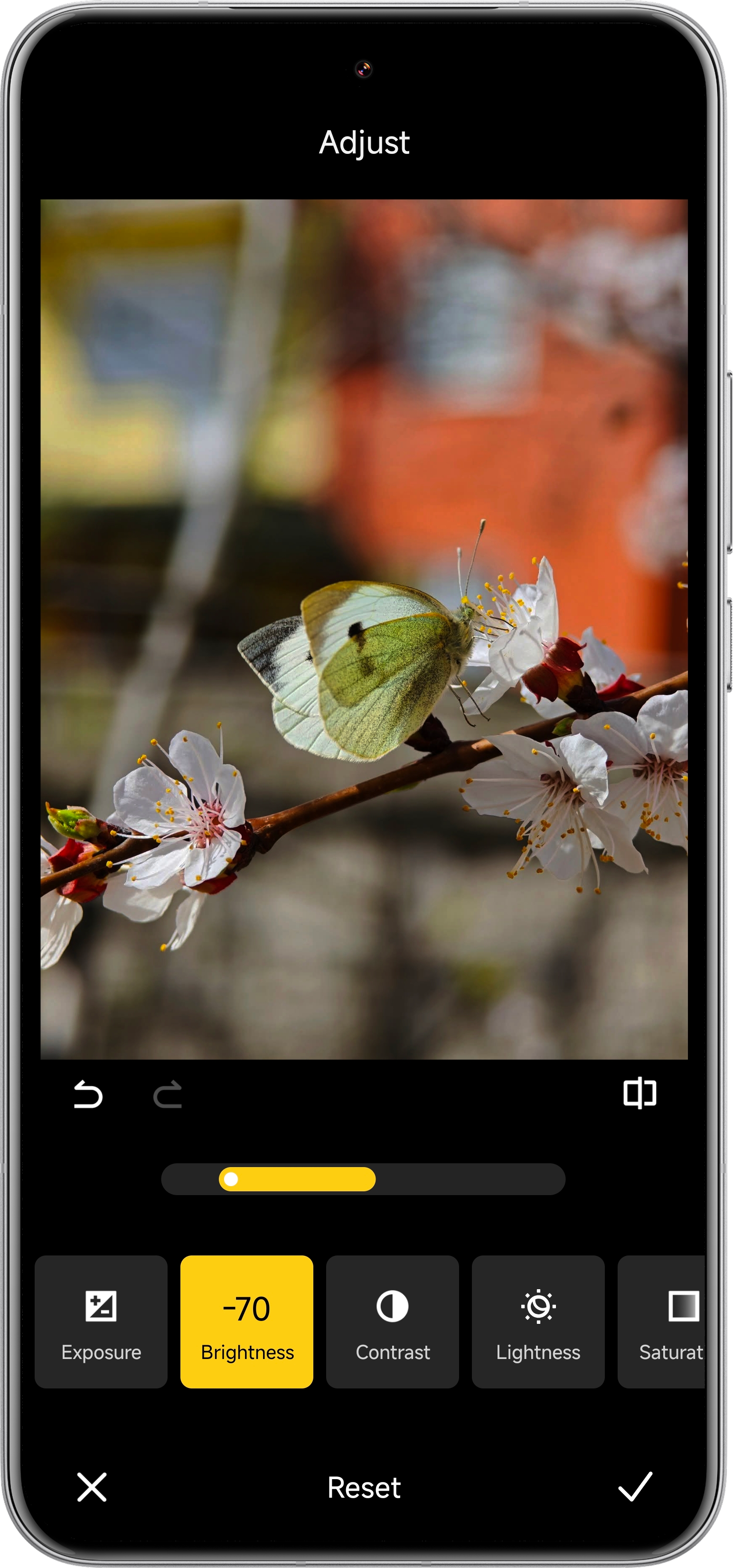 Using the built-in gallery photo editor to adjust the brightness of an image